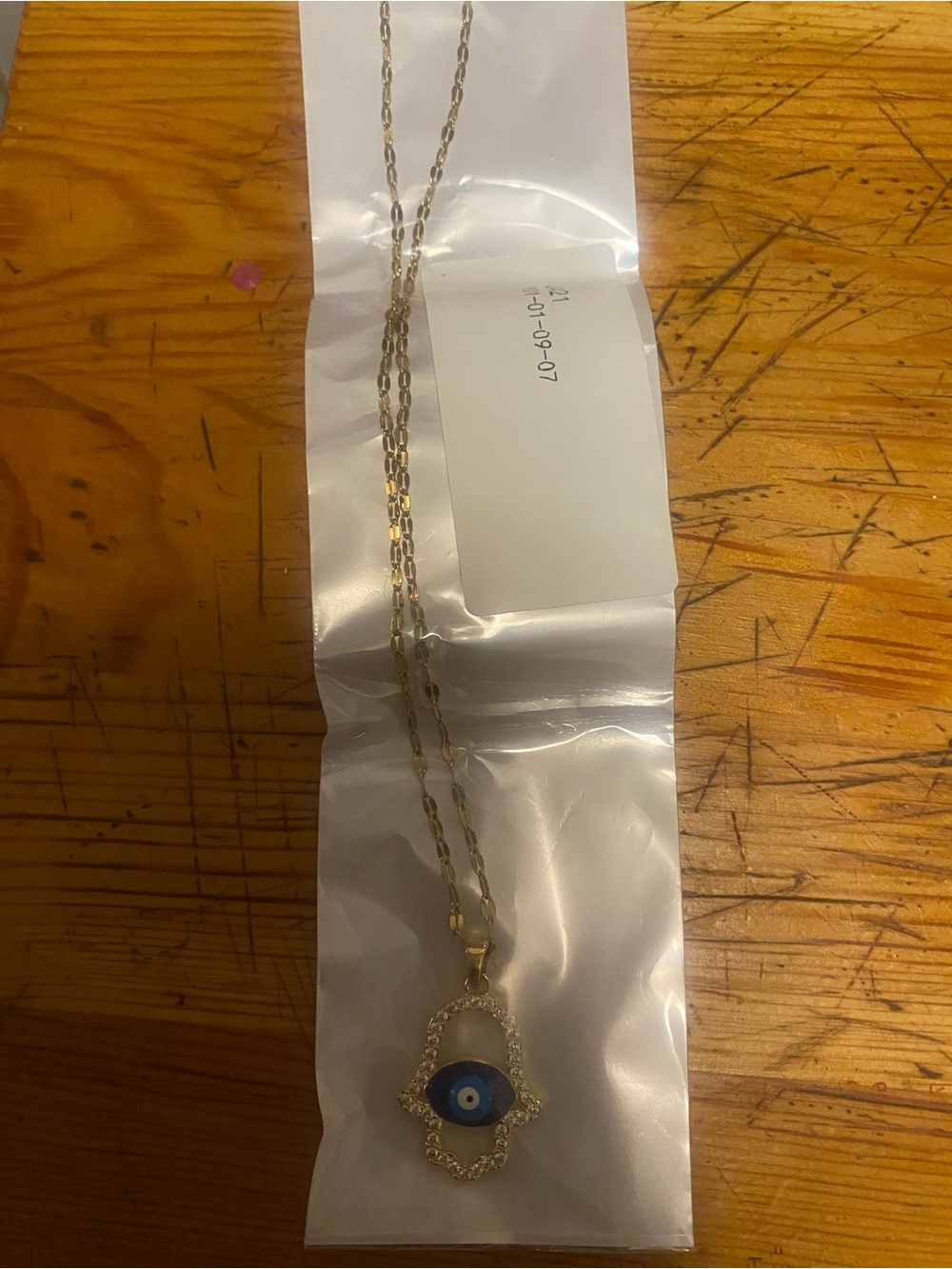 Fashion Gold Hamsa Hand Necklace with Blue Evil Eye Pendant